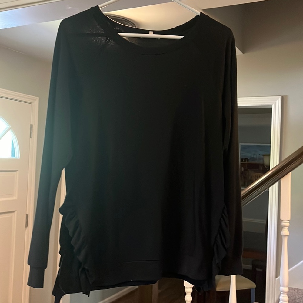 Women’s size S, Pleione black lightweight sweater, with ruffle on side.
